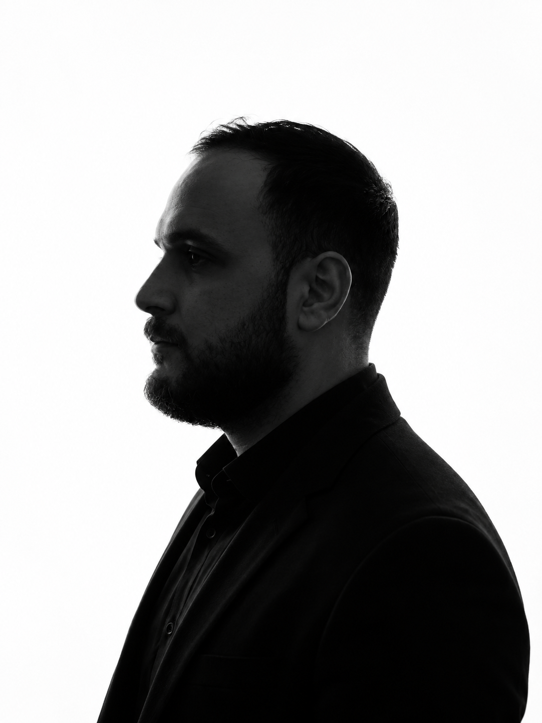 A Dramatic Side Profile Silhouette Facing Left